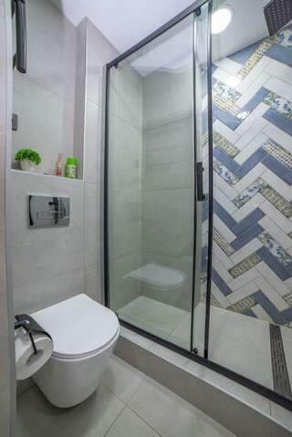 Гостиница Татьяна Екатеринбург Номер стандарт улучшенный с 1 односпальной и 1 двуспальной кроватью-4